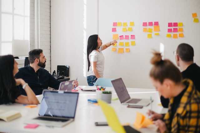 Group of people in an office planning a seamless office relocation in Manhattan